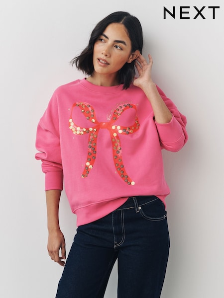 Berry Pink Cotton Rich Seasonal Bow Graphic With Sparkle Sequins Longsleeve Crewneck Sweatshirt (F76729) | £30