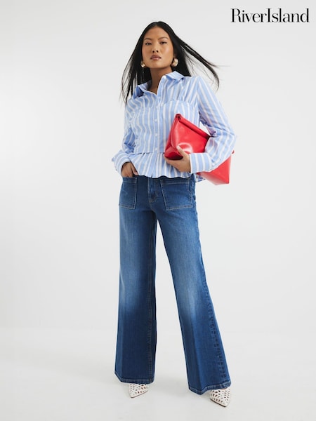 River Island Blue Relaxed Petite High Rise Flare Jeans (H42807) | £57