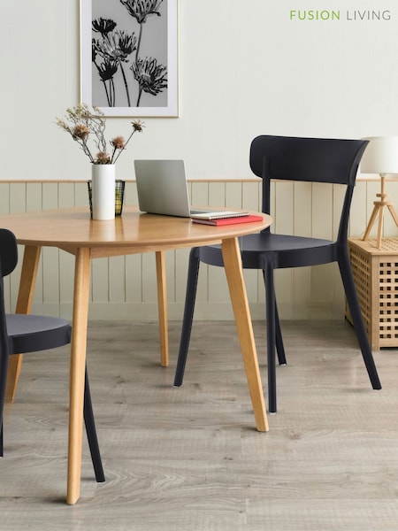 Fusion Living Black Bistro Plastic Dining Chair (H50719) | £130