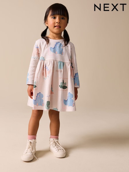 Cream Dinosaur Long Sleeve Jersey Dress (3mths-7yrs) (H57641) | £7 - £9
