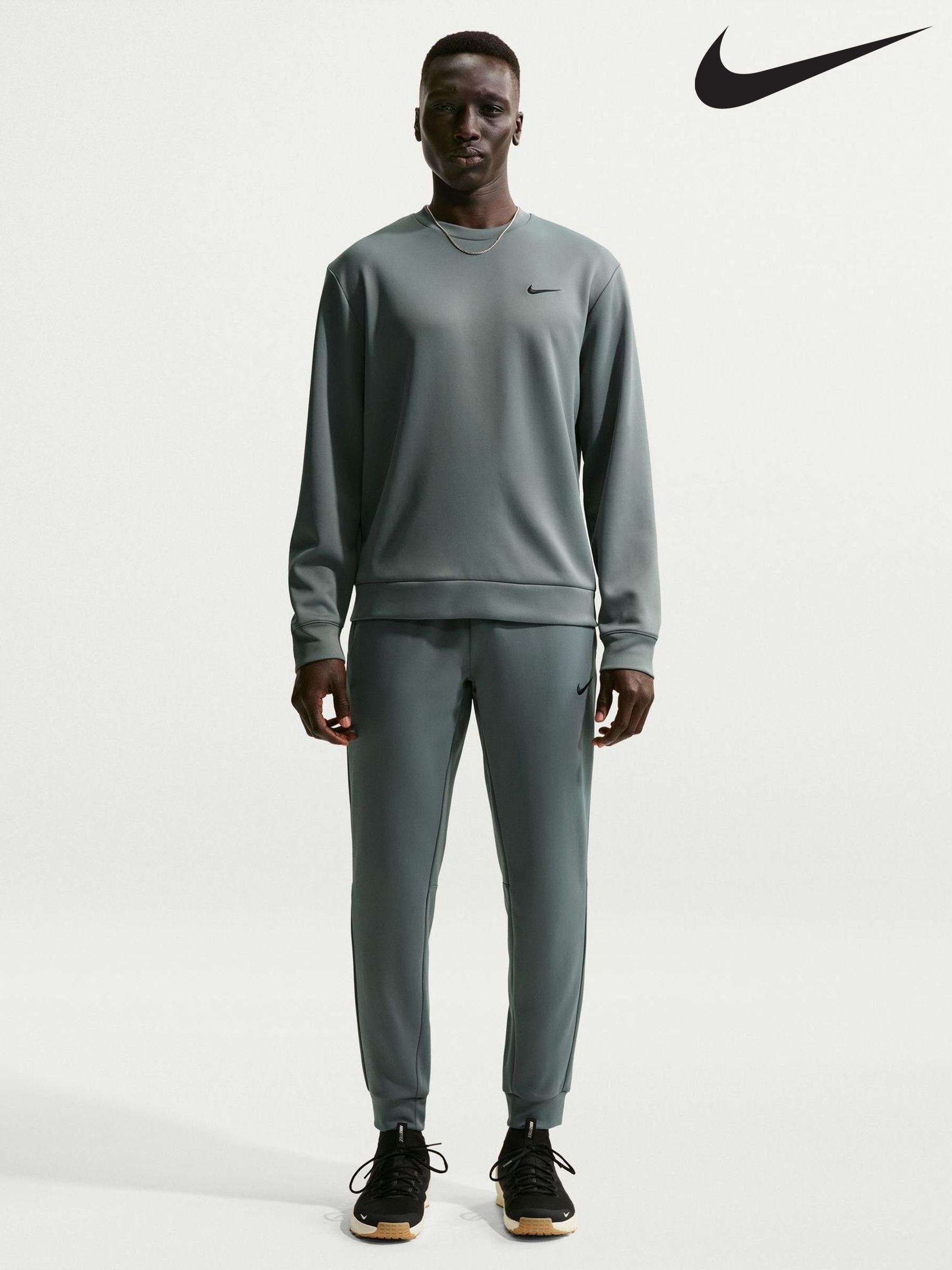 nike training tall therma tapered joggers in grey