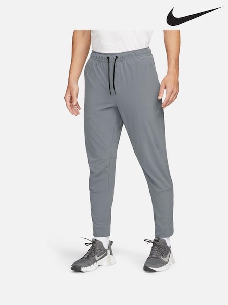 Nike Grey Unlimited Dri-FIT Zippered Training Joggers (K87139) | £70