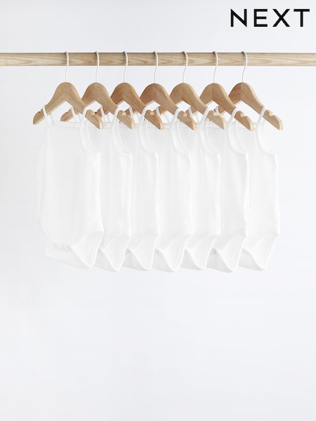 White 7 Pack Baby Strappy Bodysuits (T25694) | £12 - £14