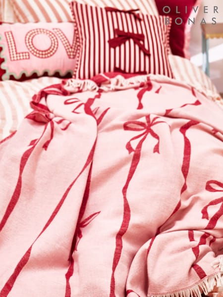 Oliver Bonas Multi Pink & Burgundy Bows Reversible Jacquard Throw (V27559) | £40