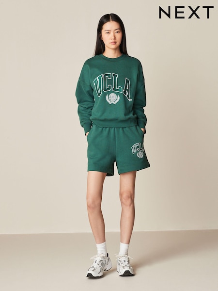 Green Licence UCLA Collegiate University Graphic Varsity Slogan Sweat Shorts (124401) | €15