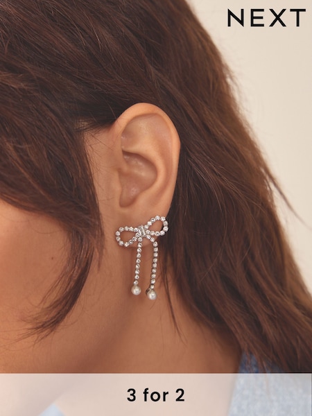 Silver Tone Sparkle Bow Earrings (411812) | €11