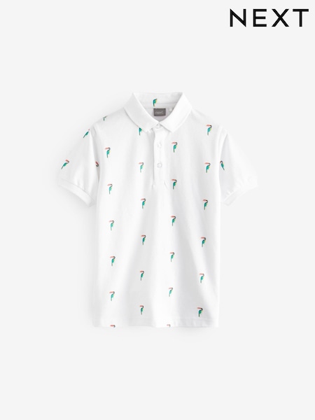 Bel s potiskom tukana - All-Over Print Short Sleeve 100% Cotton Polo Top (3-16yrs) (504312) | € 10 - € 14