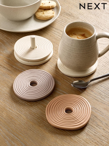 Set of 4 Natural Sculptural Ceramic Coasters (567228) | 48 QAR
