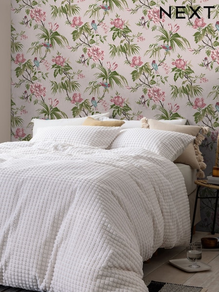 Papel pintado de pájaros y flores en malva