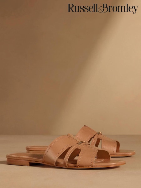 Iedeguma tonis - Russell & Bromley Clyde plakanās mūļu sandales