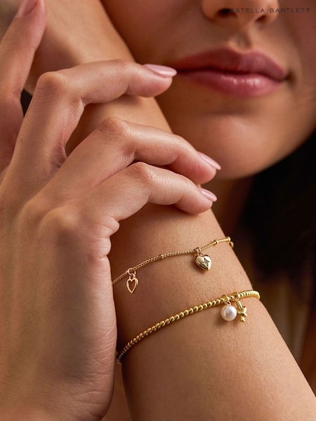 Auksinis tonas - Estella Bartlett Pearl And Knot Stretch Bracelet