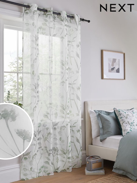 Green Isla Floral Printed Eyelet Unlined Sheer Panel Voile Curtain (882534) | €20 - €29