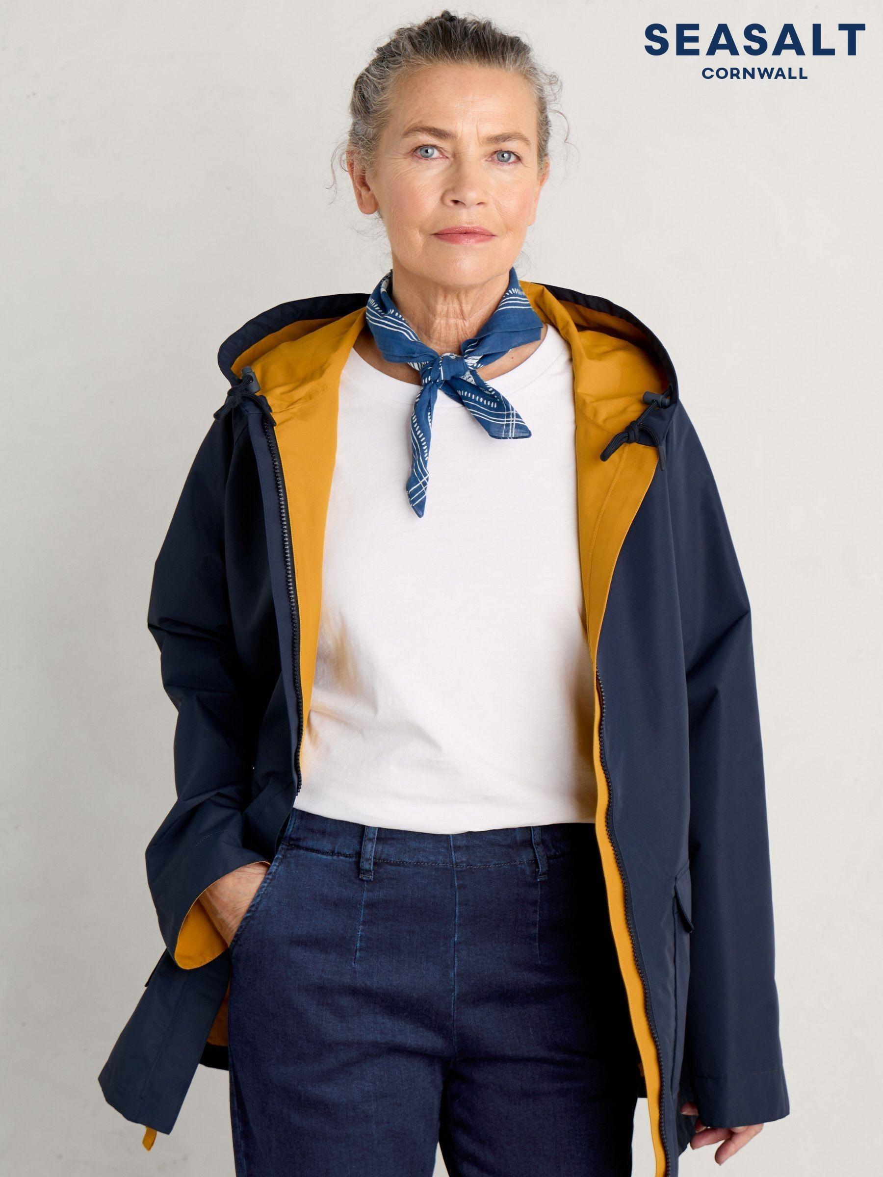 Yellow raincoat woman on sale