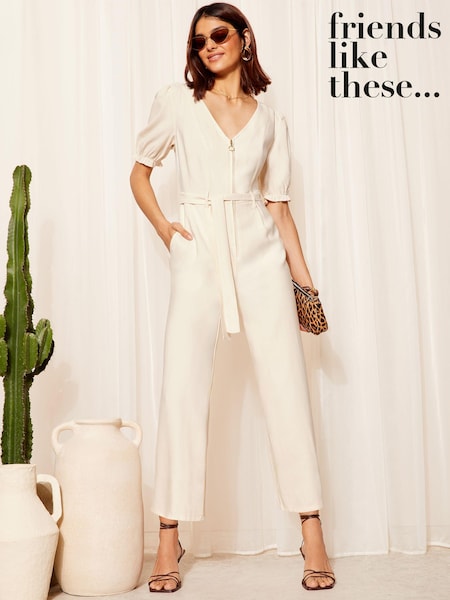 Friends Like These Cream Petite Puff Sleeve Zip Front Tie Waist Jumpsuit (979217) | € 45