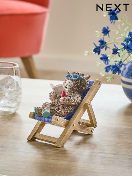 Hamish The Highland Cow Sunbathing Ornament (AC5124) | R$ 135