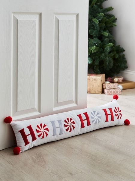 Catherine Lansfield White/Red Christmas Ho Ho Ho Pom Pom Draught Excluder (AD3439) | €23