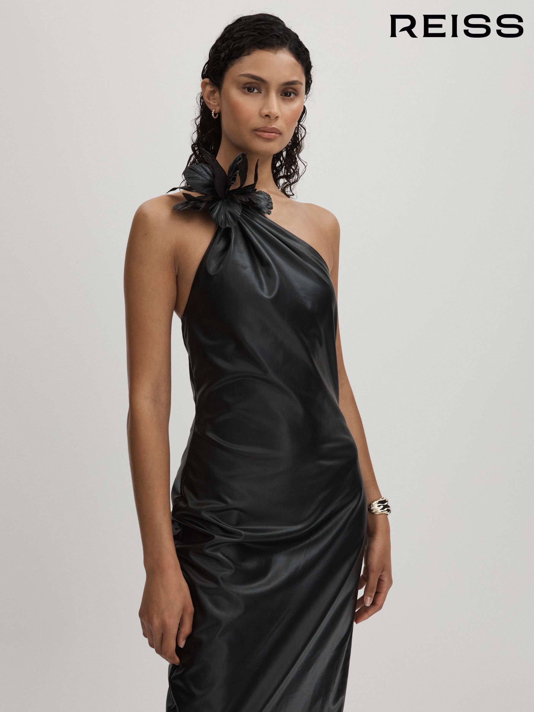 Woman in black leather dress cheap