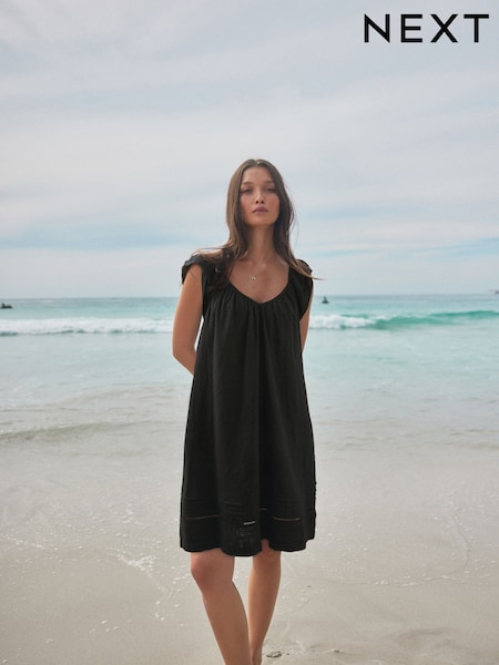 Schwarz - Minikleid mit V-Ausschnitt und Rüschenärmeln aus Leinen (AG5117) | 42 €