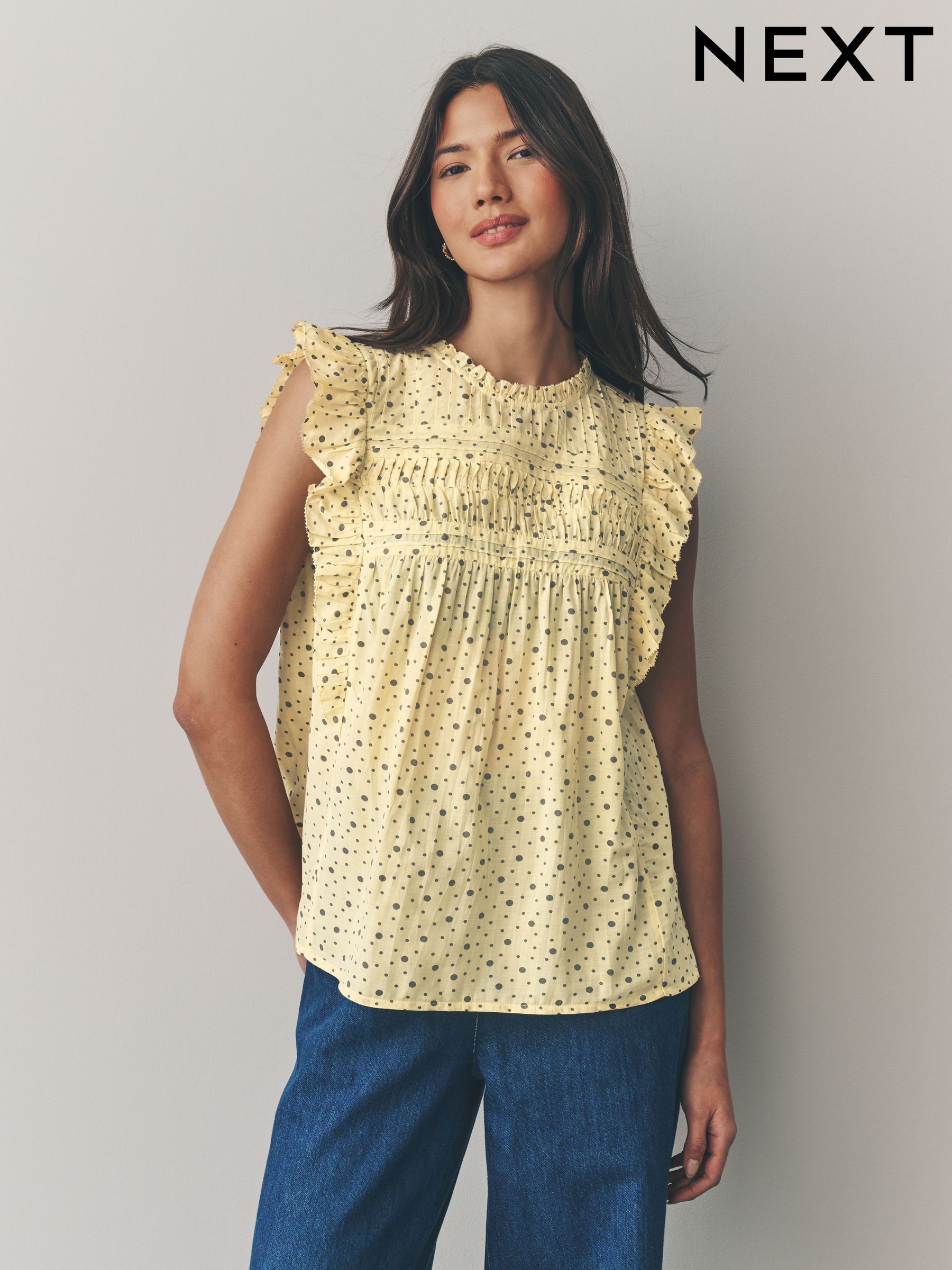 tops with frilly sleeves