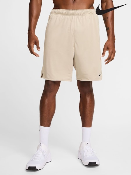 Коричневый - Nike Totality Dri-FIT 9 inch Unlined Versatile Shorts (AJ1832) | €44