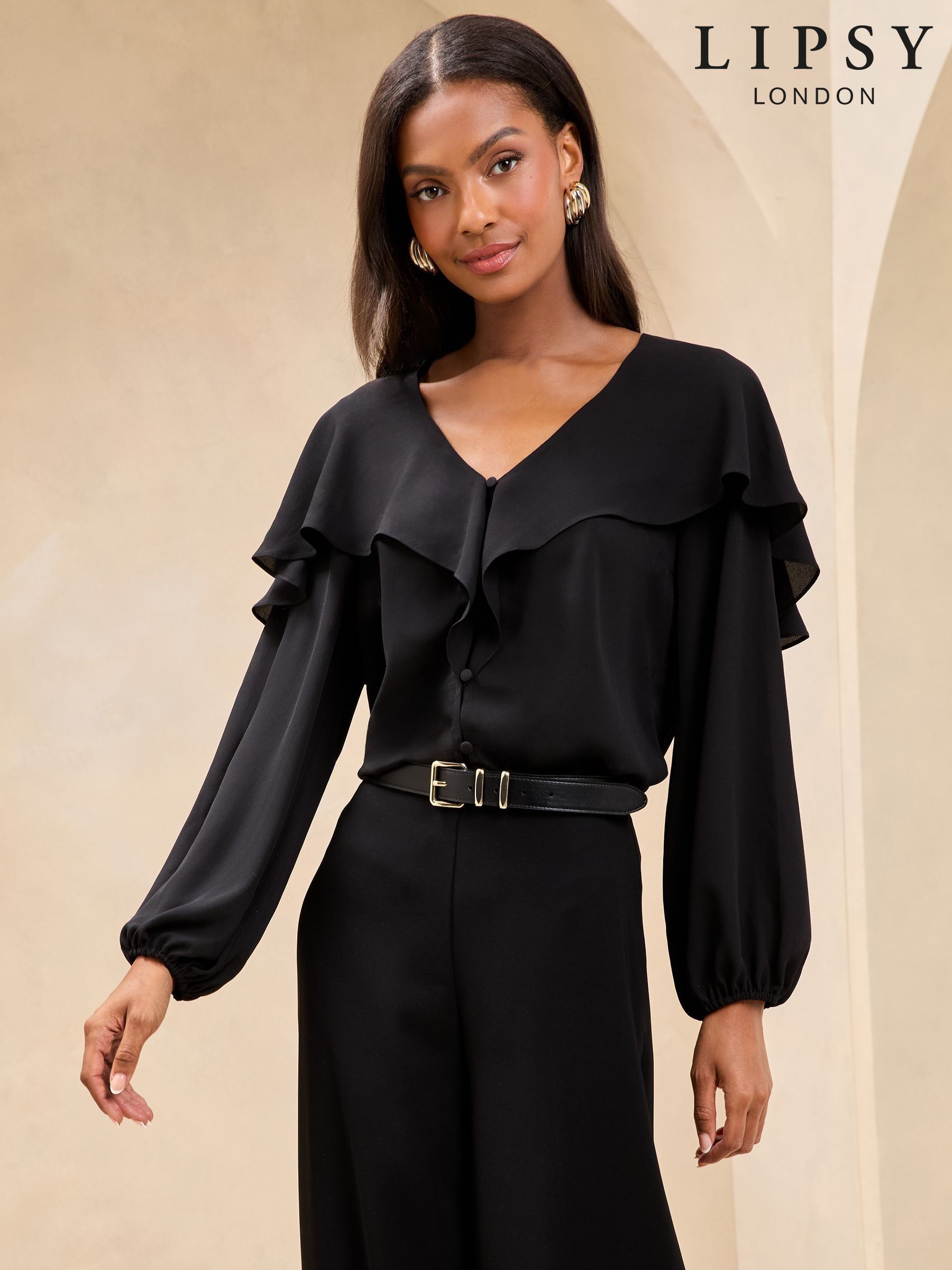 black ruffle blouse