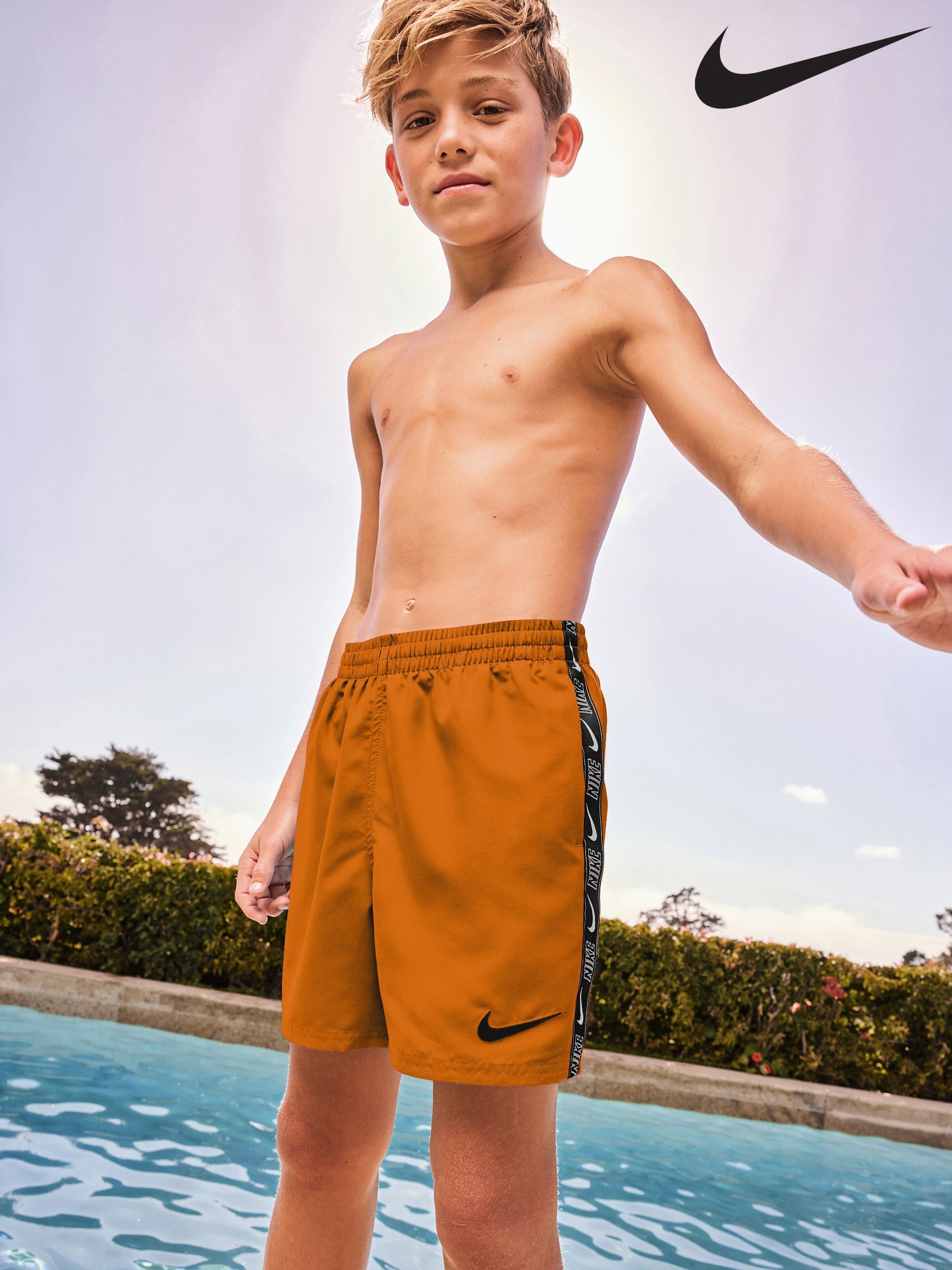 nike orange swim trunks
