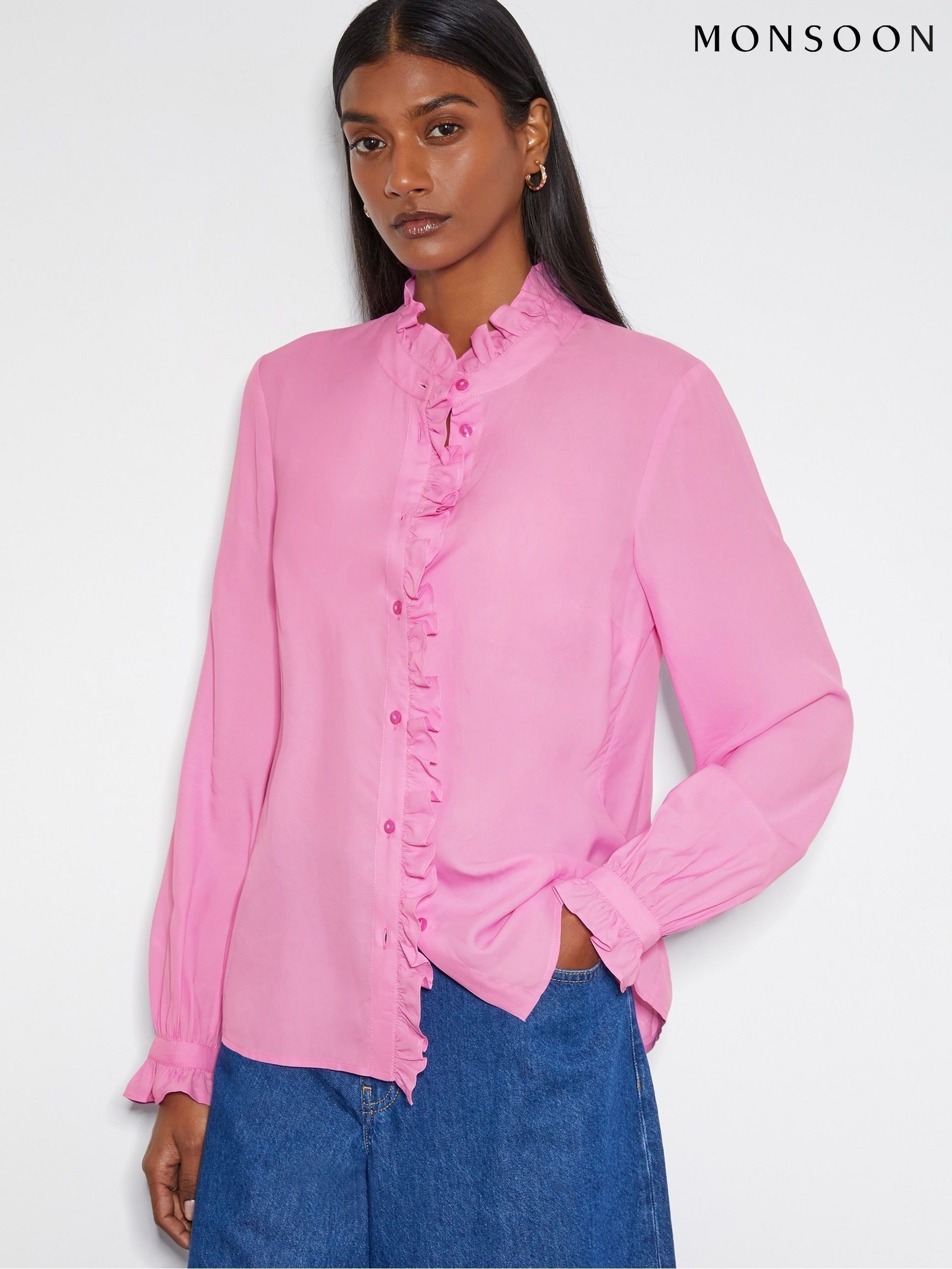 pink frilly blouse