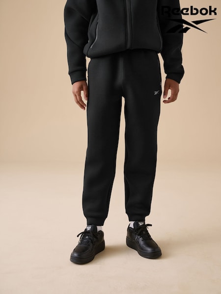 Reebok Sports Tech Zip Pockets Cuffed Black Joggers (AR6146) | €28 - €35