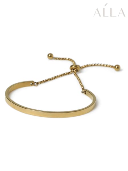 Aela Gold Tone Waterproof Stainless Steel Tie Me Up Bangle (AR9739) | €32