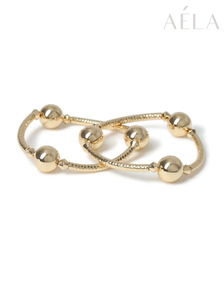 Aela Gold Tone Stretch Ball Bracelet (AR9780) | €22