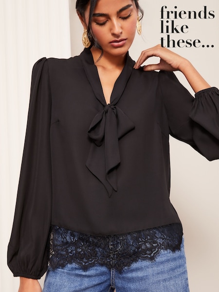 Friends Like These Black Long Sleeve Bow Front Lace Hem Blouse (AT9365) | SGD 62