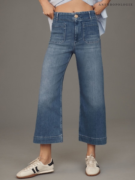 כחול  - Anthropologie מכנסי ג'ינס קרופ בגזרה רחבה, דגם Maeve The Colette