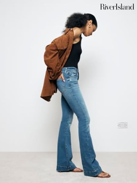 River Island Blue High Rise Tummy Hold Flare Jeans (B17952) | $93