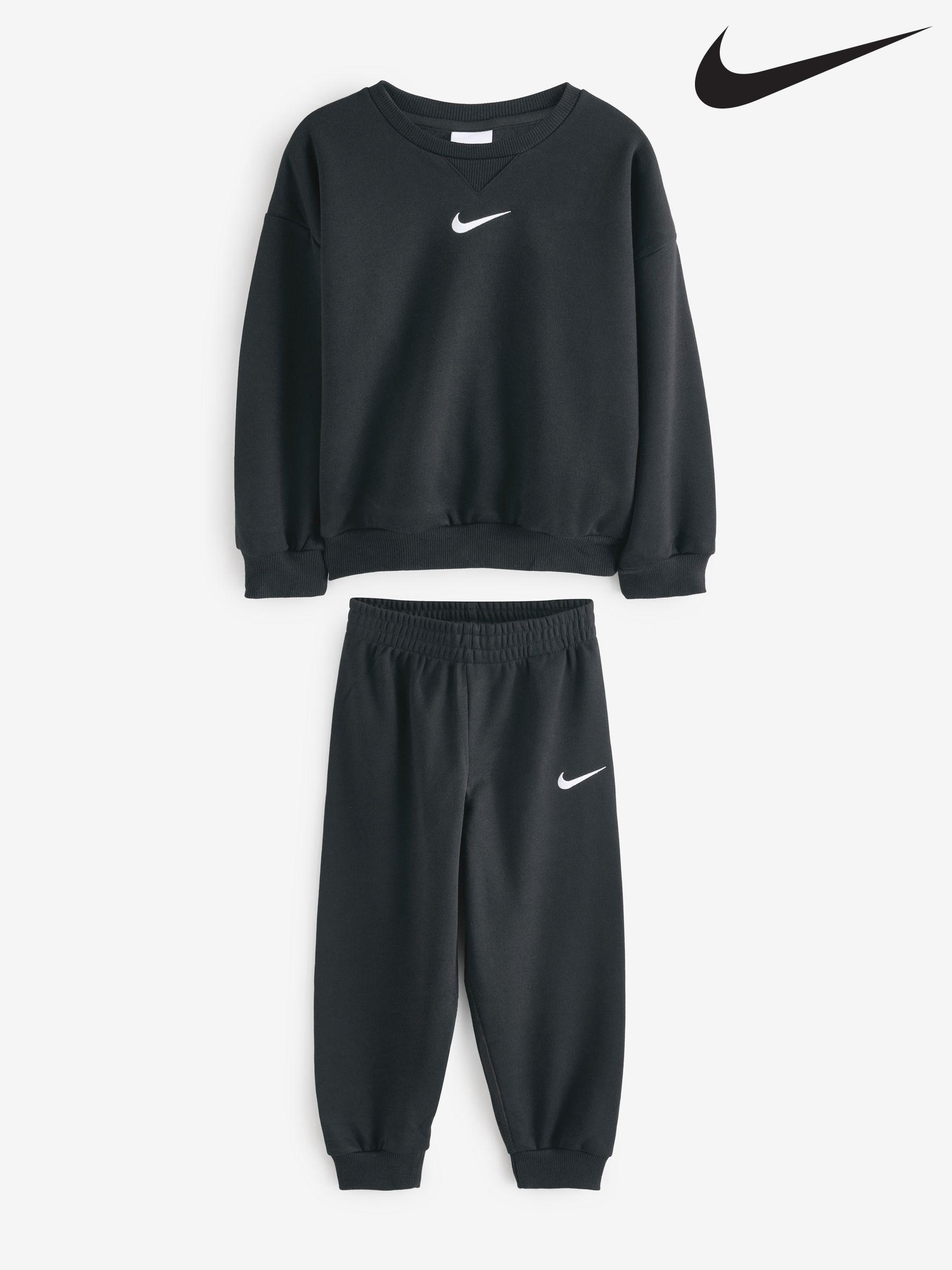 Junior black nike tracksuit 2025