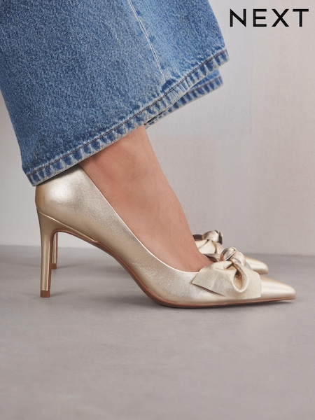 Gold Forever Comfort® Leather Bow Mid Court Shoes (B36411) | 215 QAR