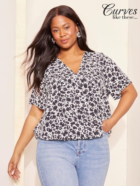 Curves Like These Short Sleeve Wrap Blouse (B63550) | 129 LEI
