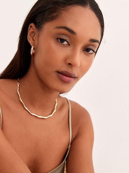 Gold Tone Recycled Metal Bamboo Slim Torque Necklace (D24640) | €8