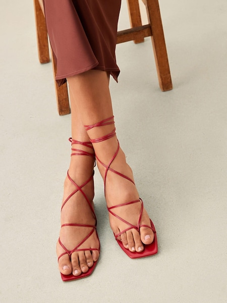 Red Signature Leather Ankle Wrap Flat Sandals (D56141) | €15