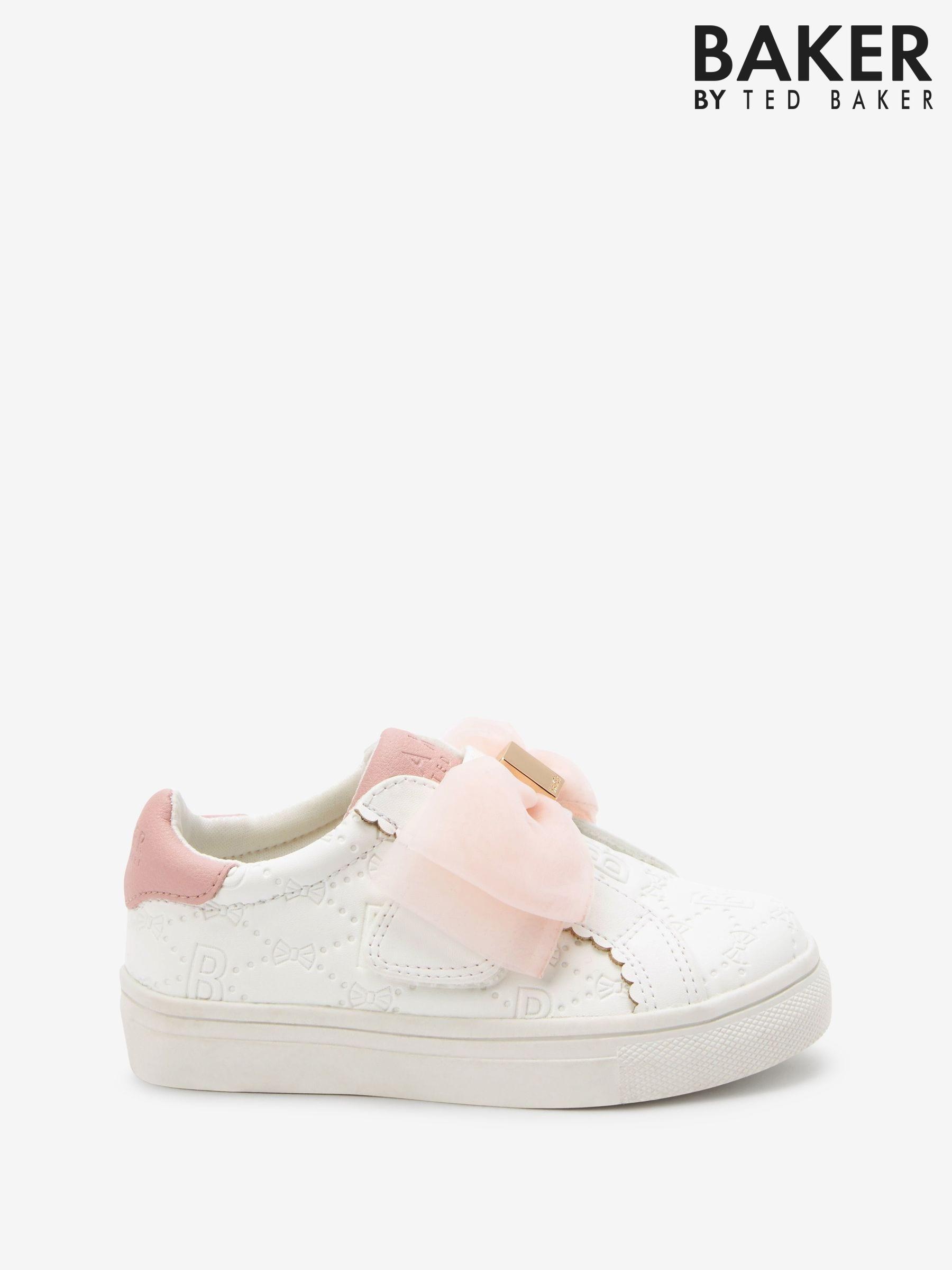 Pink bow trainers top
