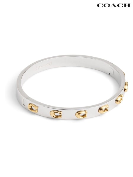 COACH Two Tone Signature C Hinged Bangle Bracelet (D68368) | AED437