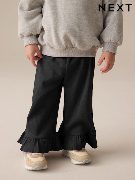 Black Textured Frill Hem Wide Trousers (3mths-7yrs) (E13722) | AED25 - AED32