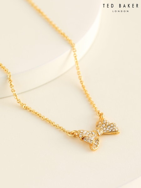 Ted Baker Gold Tone BARSIE Crystal Bow Pendant Necklace (E21655) | €23