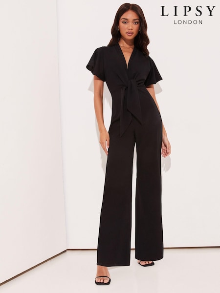 Negro - Lipsy Flutter Sleeve V Neck Tie Front Wide Leg Jumpsuit (E22954) | 74 €