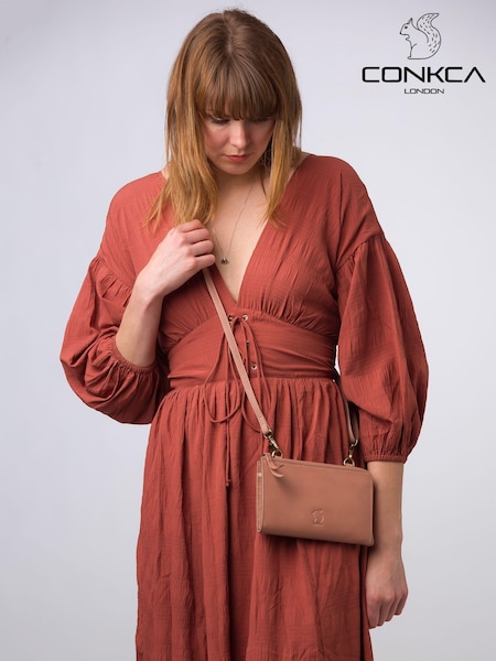 Conkca 'Winnie' Leather Cross-Body Clutch Bag (E24572) | $68