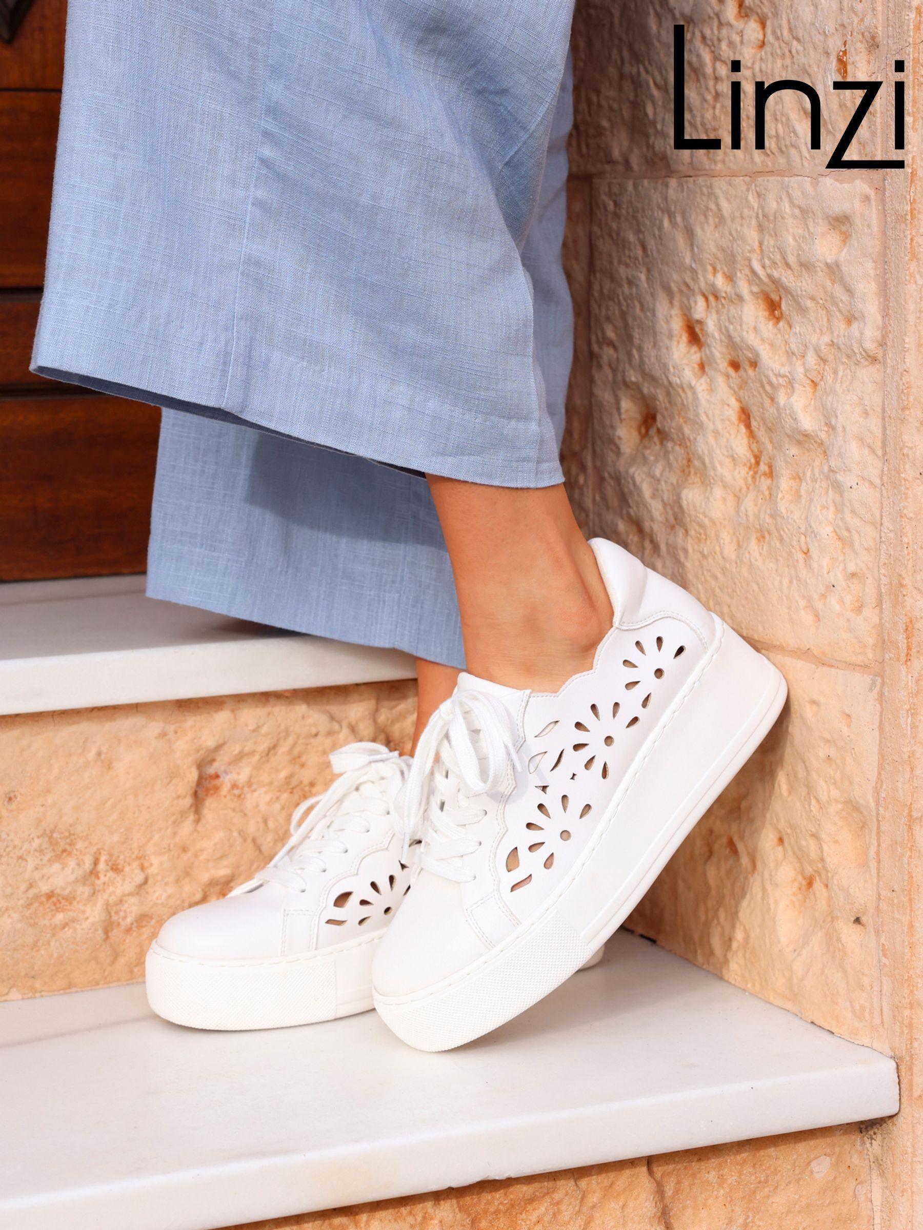 White flat trainers top