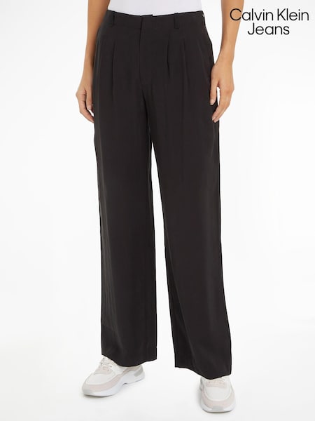Negru - Pantaloni chino relaxați din viscoză Calvin Klein Jeans (E30085) | 459 LEI
