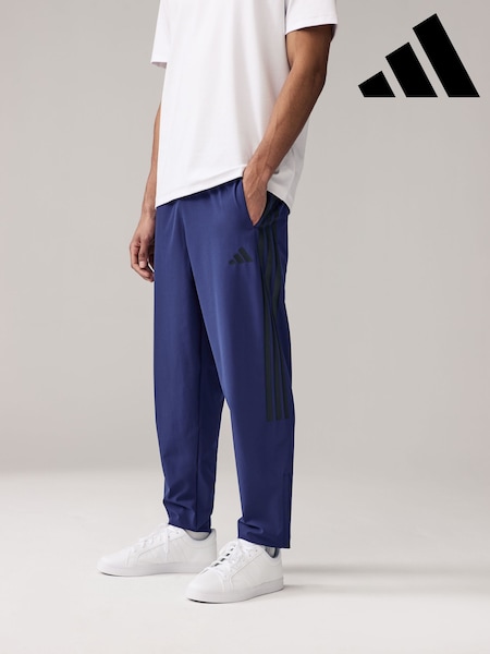 Синий - adidas House of Tiro Woven Joggers (E35941) | €60