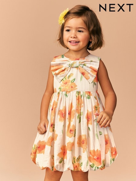 برتقالي زهور - Bubble Hem Bow Dress (3mths-8yrs) (E37870) | ‏131 ر.س.‏ - ‏167 ر.س.‏