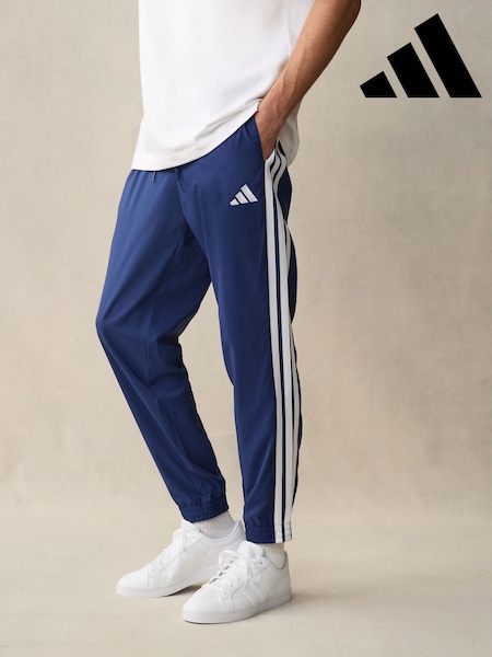 adidas Blue Essentials 3-Stripes Woven Joggers (E37949) | R$ 375
