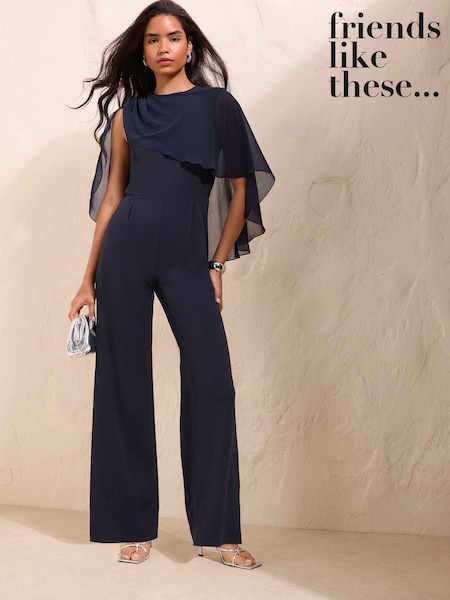 Donkerblauw - Friends Like These Asymmetrische jumpsuit met capemouwen